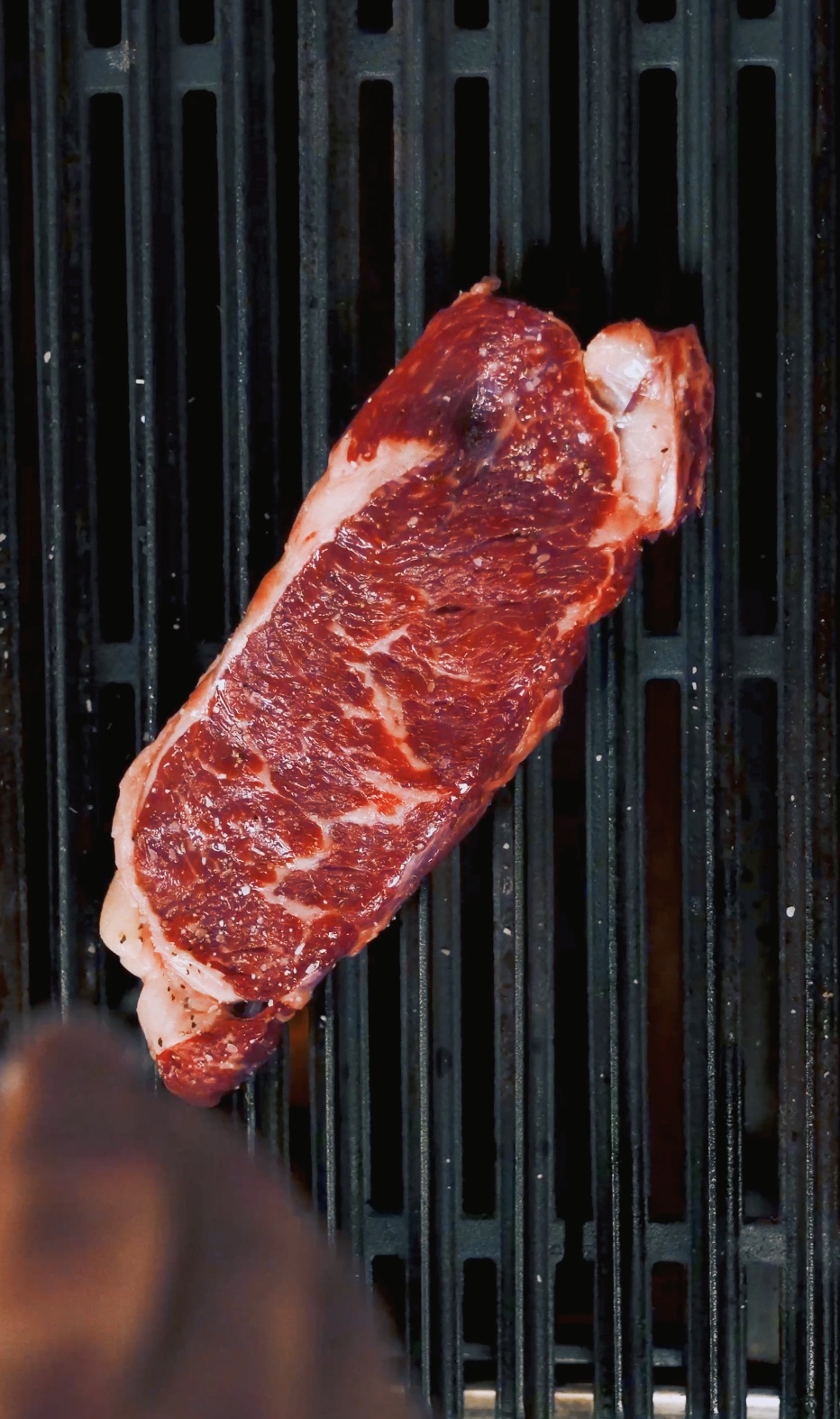 Steak on a grill — frame from a restaurant commercial